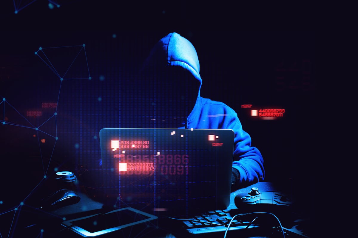 hacker man terrorist with virus computer attack to server network system online in data technology internet security hacking concept