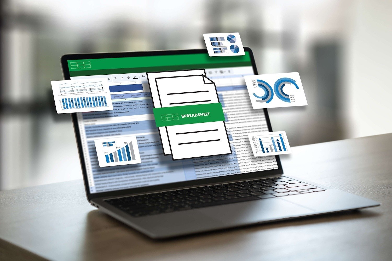 Laptop displaying a spreadsheet with superimposed charts and documents.